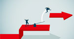An illustration shows a businessperson catapulting another businessperson over a gap and onto a higher level.