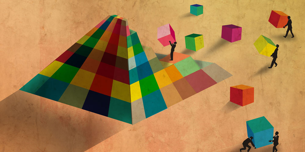 A stylized cartoon shows businesspeople assembling a pyramid with multicolored blocks.