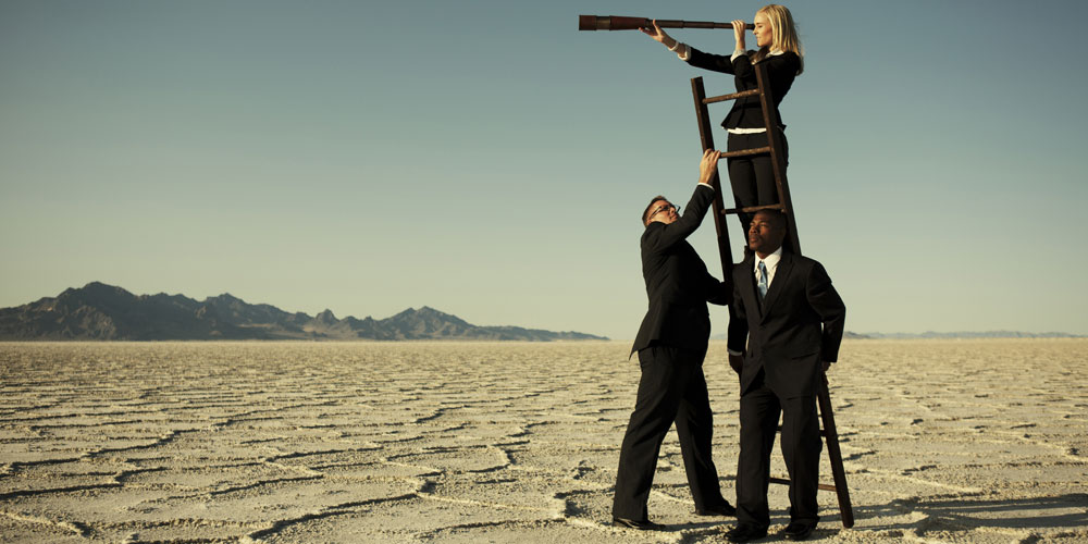 A businesswoman uses a ladder and a telescope to gain a better view.