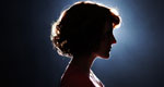 A silhouette shows a young woman in profile against a gray-blue background.