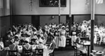 Nurses eating lunch in a hospital dining hall, 1920s