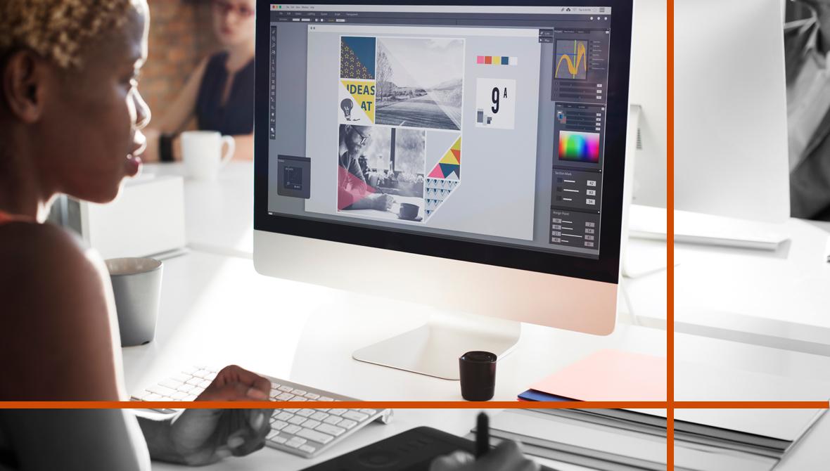 Creative professional working on digital graphics at a sleek workstation Creative professional working on digital graphics at a sleek workstation