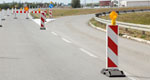 Roadway with directional signs alerting drivers to temporary changes
