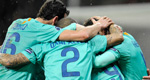 Barcelona players in a tight huddle as they celebrate a win during the 2012 UEFA Champions League