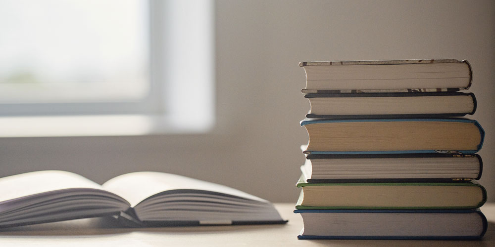 Stack Of Open Books