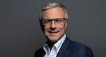 Photograph of Alain Dehaze, CEO of the Adecco Group.