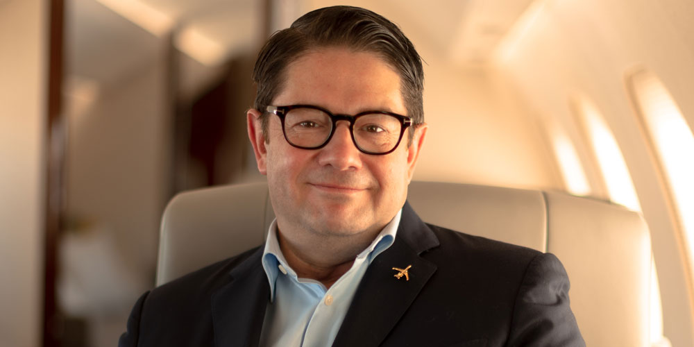 A photograph of Bombardier CEO Éric Martel.
