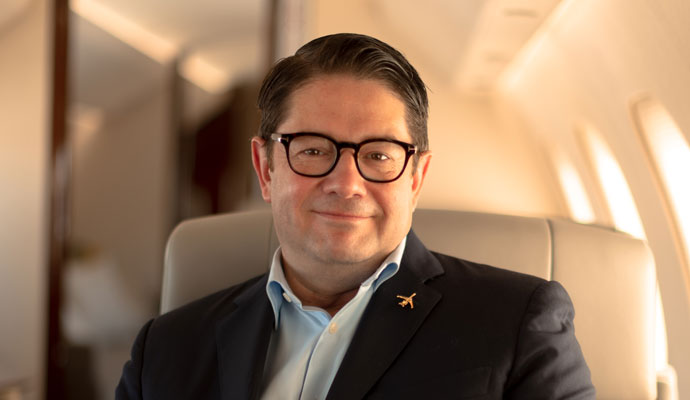 A photograph of Bombardier CEO Éric Martel.