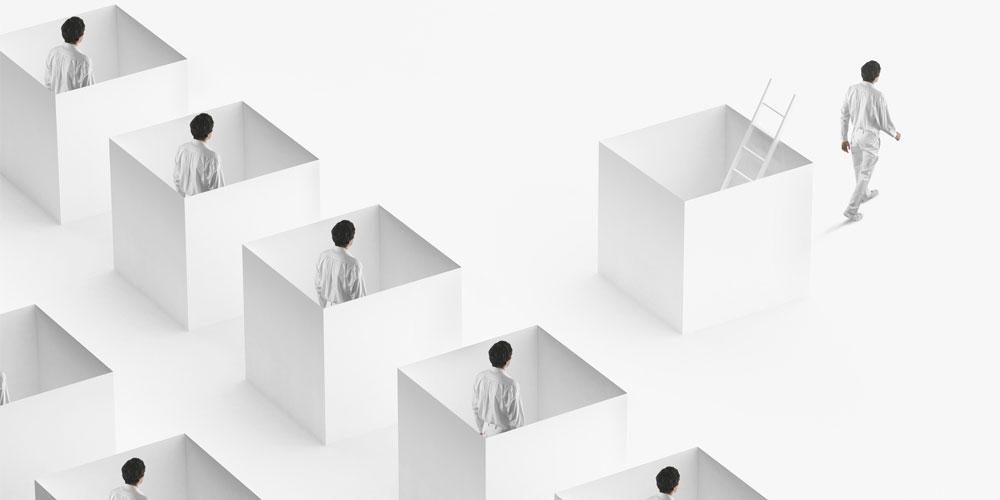 A photo-illustration of a worker using a ladder to exit one of several identical white cubes, the rest of which are occupied.