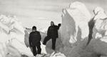 Black-and-white photograph of Ernest Shackleton and Frank Wild scouting for a path.