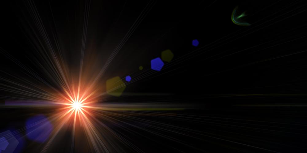 A photograph of a bright star in the blackness of space