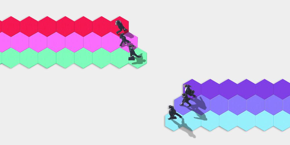 Overhead photo of two groups of three businessmen; the groups are walking on illustrated color tiles toward the center of the image