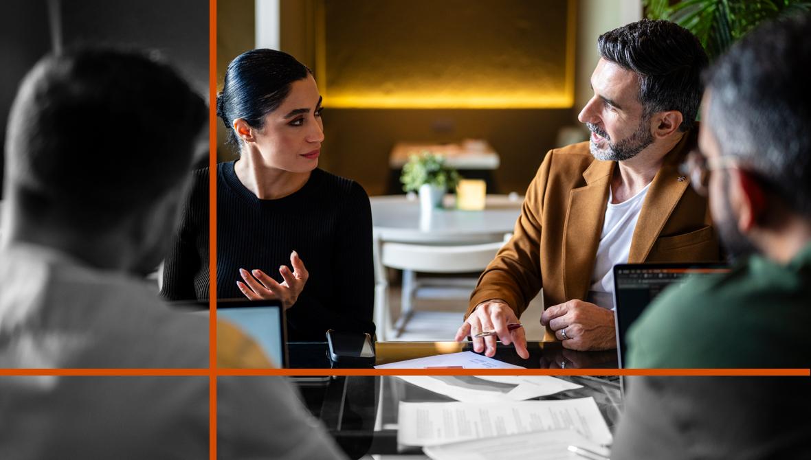 At an informal meeting, a businesswoman leads a discussion with three colleagues. At an informal meeting, a businesswoman leads a discussion with three colleagues.