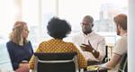 Diverse business people having meeting in office