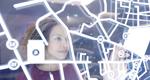 A woman operates a digital interface