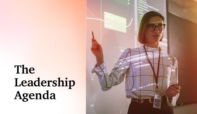Woman working on electronics with the words “The Leadership Agenda” superimposed on the image
