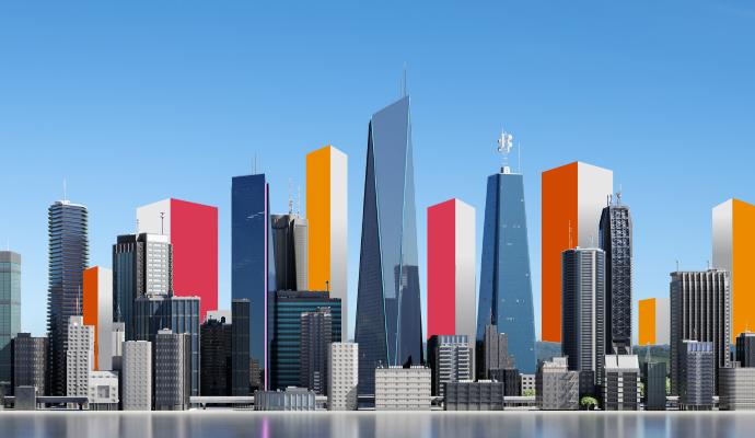 A city skyline with colorful digital overlays on some of the buildings